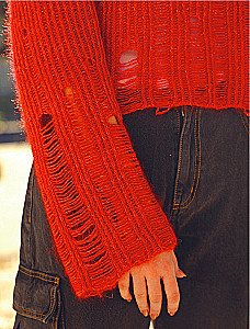 Knit like a designer. Luxury distressing on needles. How to knit and ruin a designer sweater to be trendy and look expensive