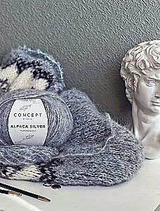 Cloud on needles. Knitting with fluffy yarn