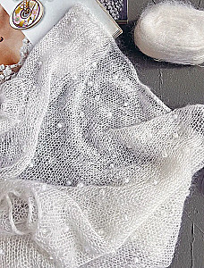 Cloud on needles. Knitting with fluffy yarn