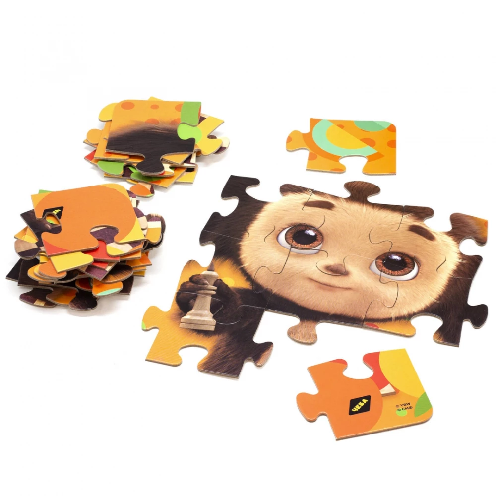 Puzzle of 35 pieces. Cheburashka and chess