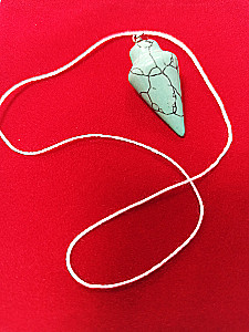 Pendulum for biolocation made of stone. Turquoise (string + pouch) No. 3
