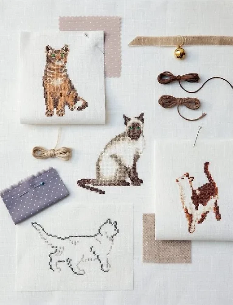 Lieblings französische Stickerinnen. Geheimnisvolle Katzen, gestickt mit Kreuzstich. 100 einzigartige Designs mit Mustern